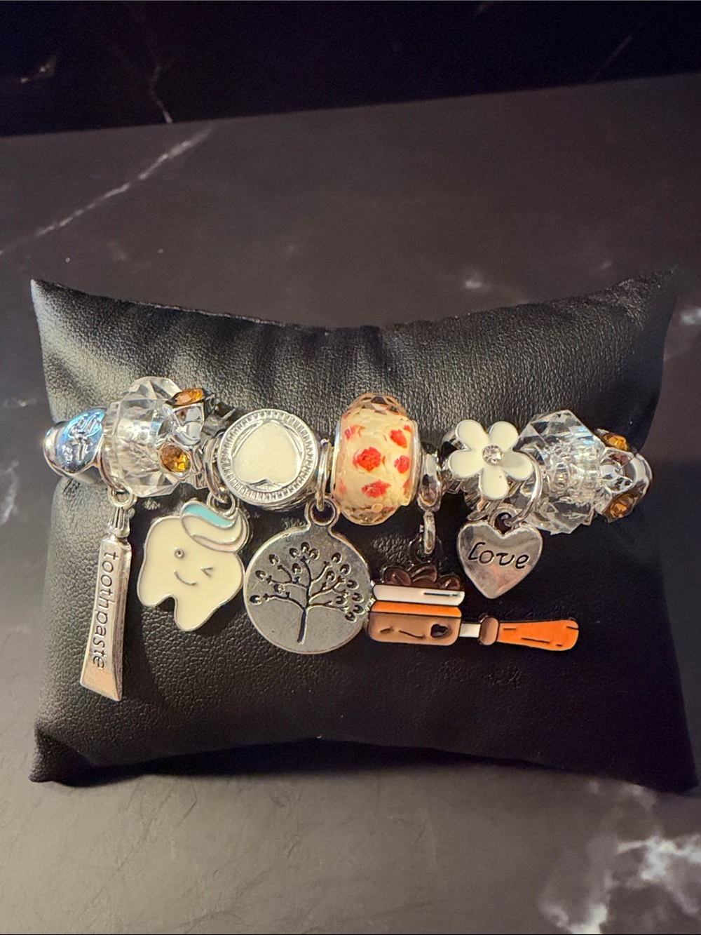 Silver Dentist Charm Bracelet with White, Orange and Clear Accents